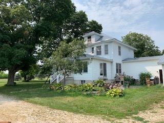 13182 Lyndon Road Morrison, IL 61270 - Photo 19 of 19 a front view of house with a garden