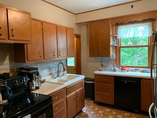 13182 Lyndon Road Morrison, IL 61270 - Photo 3 of 19 a kitchen with a sink and a stove top oven