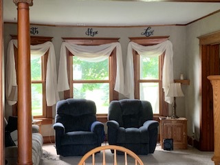 13182 Lyndon Road Morrison, IL 61270 - Photo 7 of 19 a living room with furniture and a window