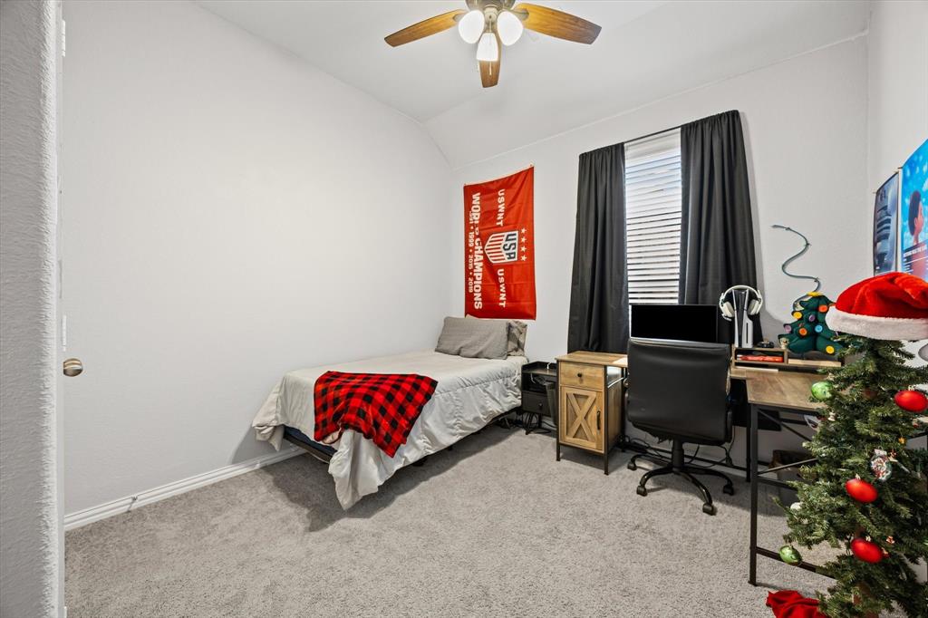5405 Ranger Drive Midlothian, TX 76065 - Photo 18 of 29 Bedroom with light carpet, vaulted ceiling, a ceiling fan, and an office area