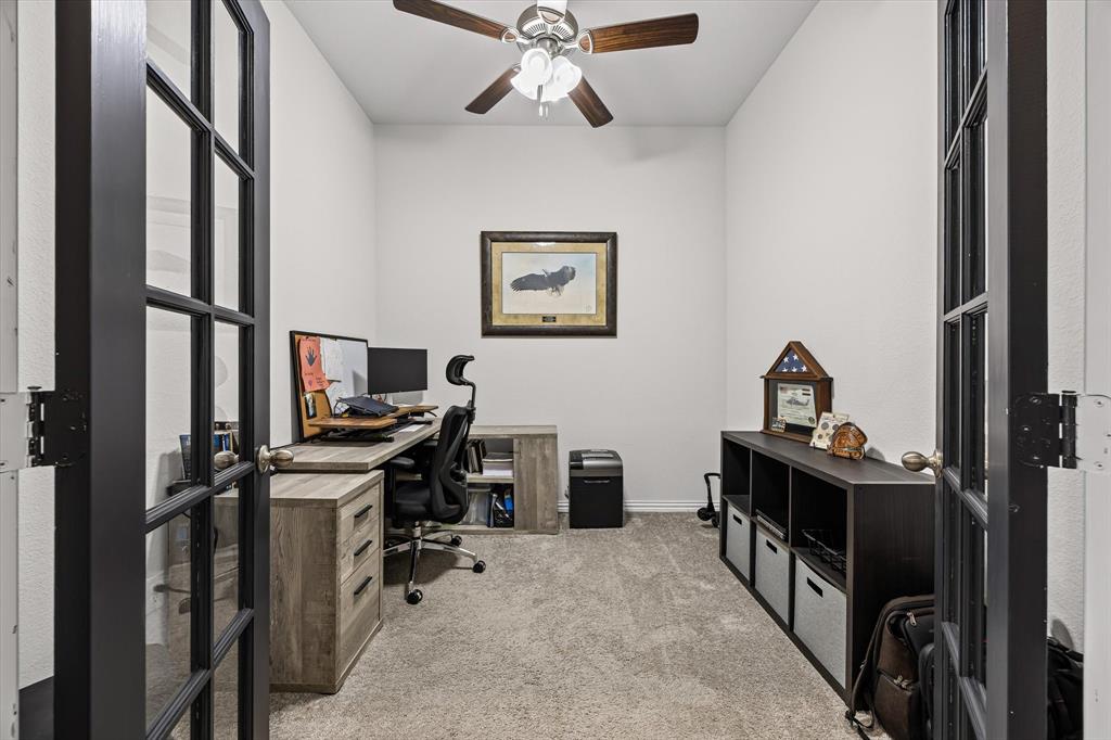 5405 Ranger Drive Midlothian, TX 76065 - Photo 9 of 29 Home office with light colored carpet, ceiling fan, and french doors