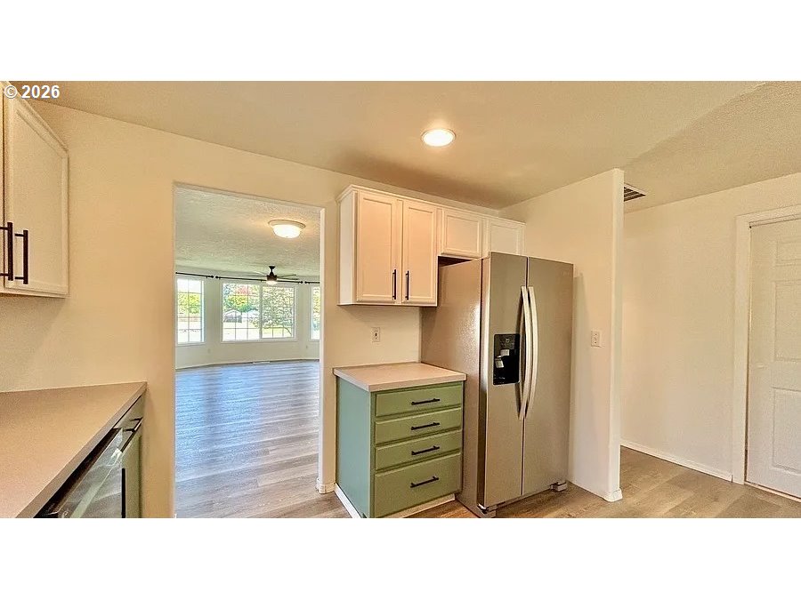 19504 Southwest Stacey Street Beaverton, OR 97003 - Photo 11 of 16 a room with furniture and wooden floor