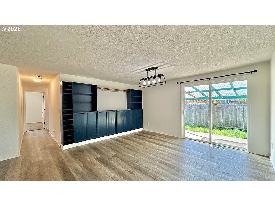 19504 Southwest Stacey Street Beaverton, OR 97003 - Photo 5 of 16 a bathroom with a sink and a vanity