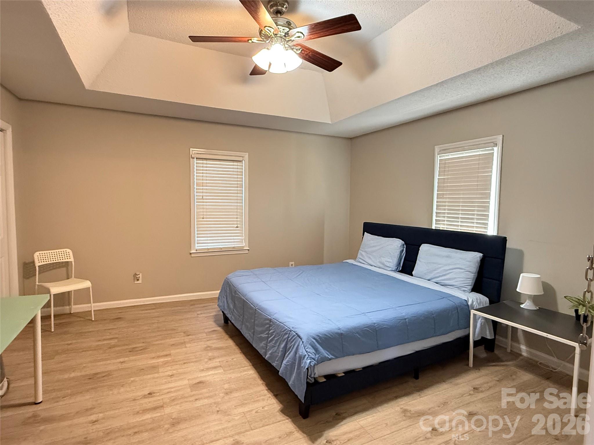 240 Nixon Road Belmont, NC 28012 - Photo 5 of 13 a bedroom with a bed and chair