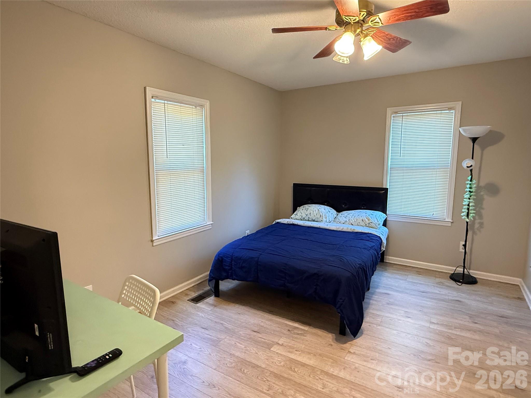 240 Nixon Road Belmont, NC 28012 - Photo 8 of 13 a bedroom with a bed and a desk