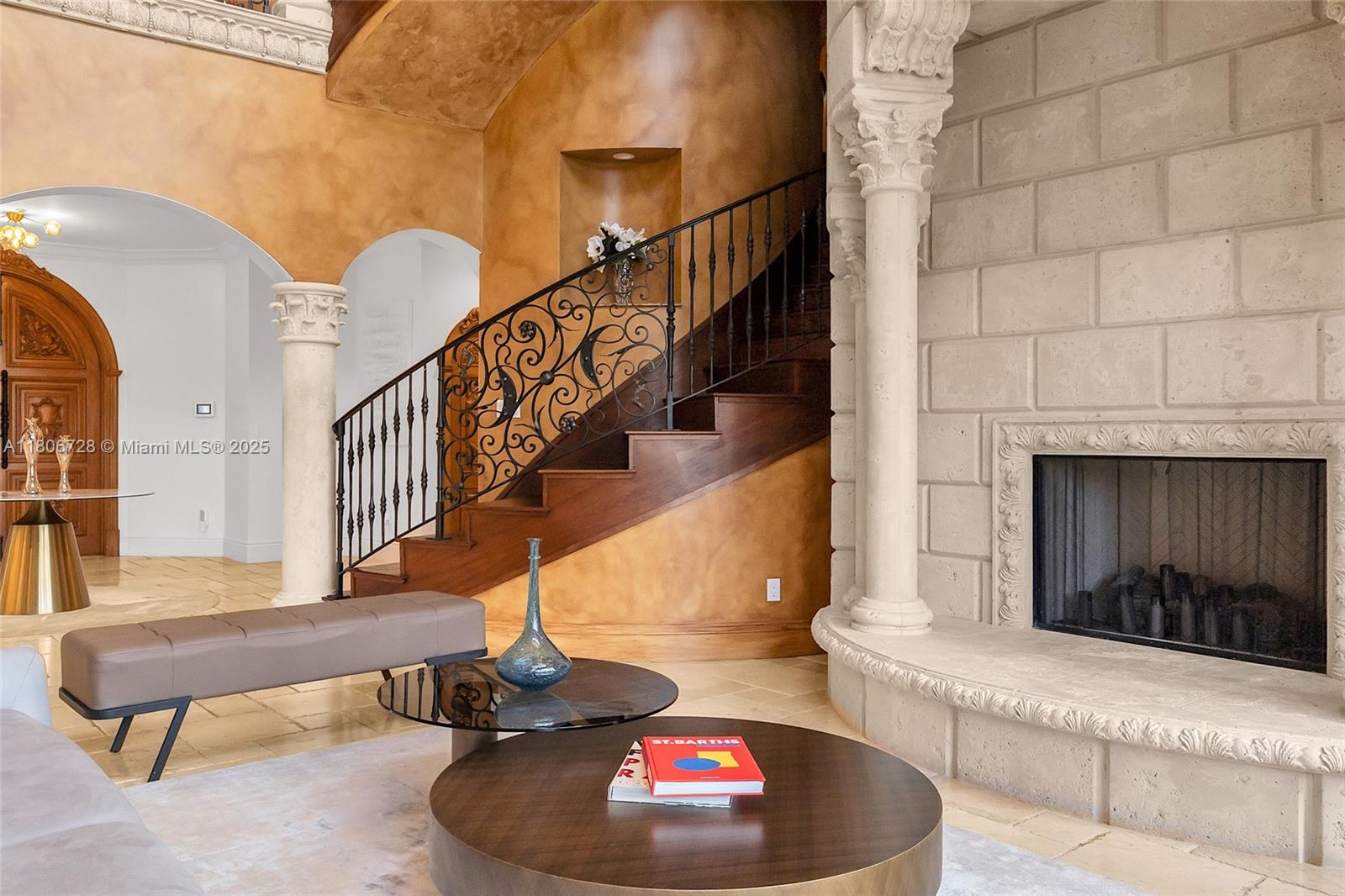 1011 Rhodes Villa Avenue Delray Beach, FL 33483 - Photo 15 of 90 a living room with furniture and a fireplace