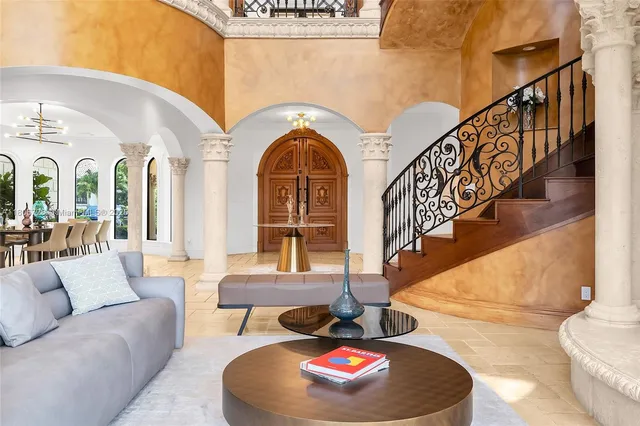 a kitchen with stainless steel appliances a stove a sink and a microwave