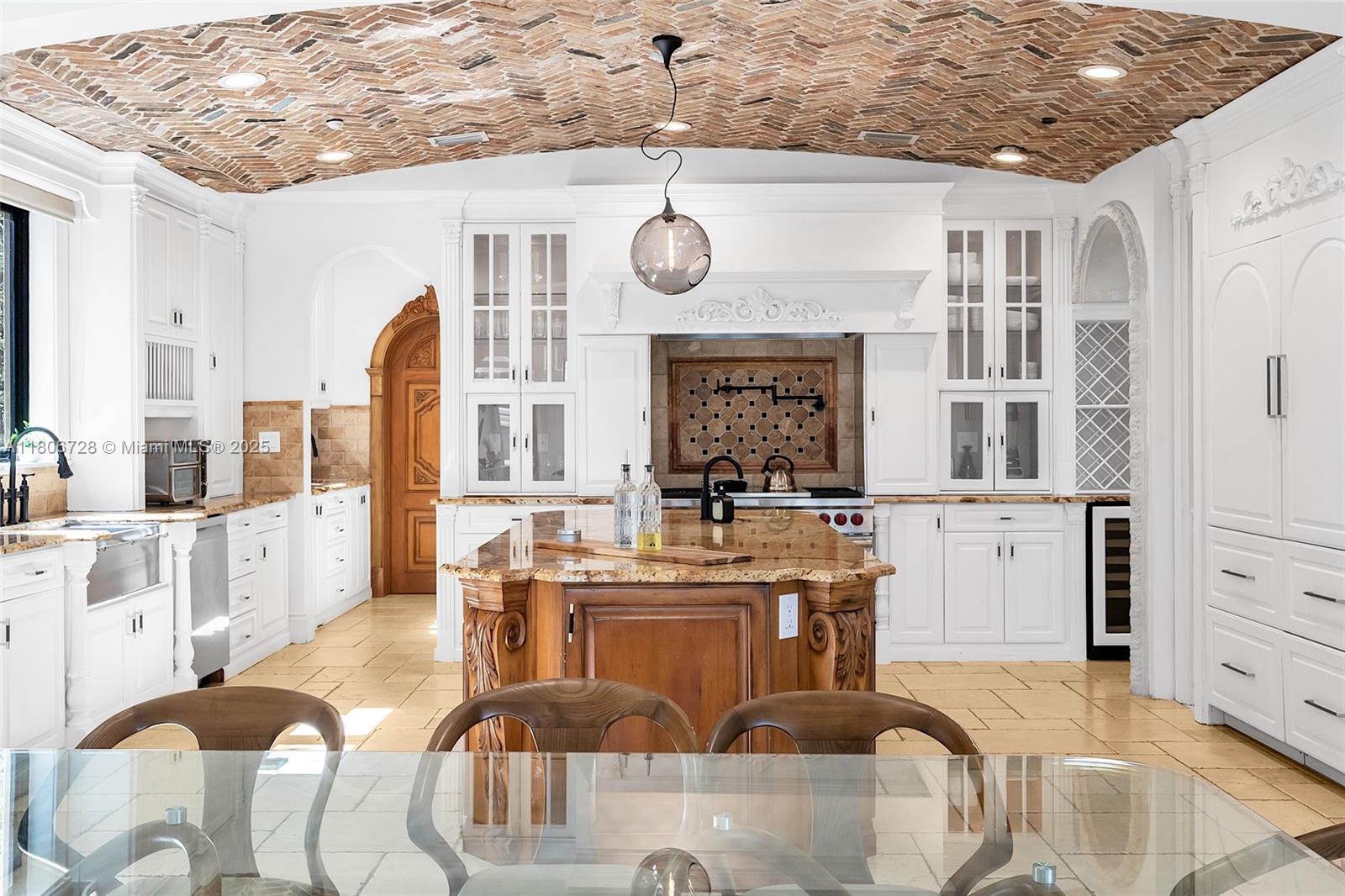 1011 Rhodes Villa Avenue Delray Beach, FL 33483 - Photo 29 of 90 a living room with stainless steel appliances granite countertop furniture wooden floor and a kitchen view