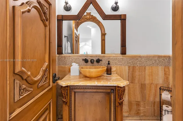 a large bedroom with a large bed and a large window