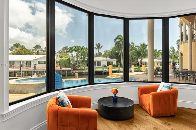 a bathroom with a granite countertop toilet sink and mirror