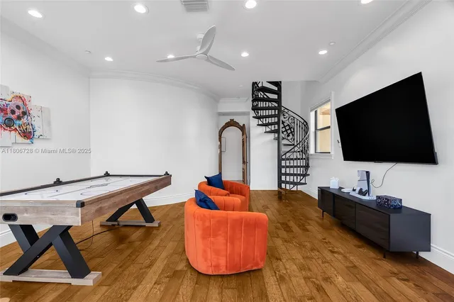 a bedroom with a bed and a mirror