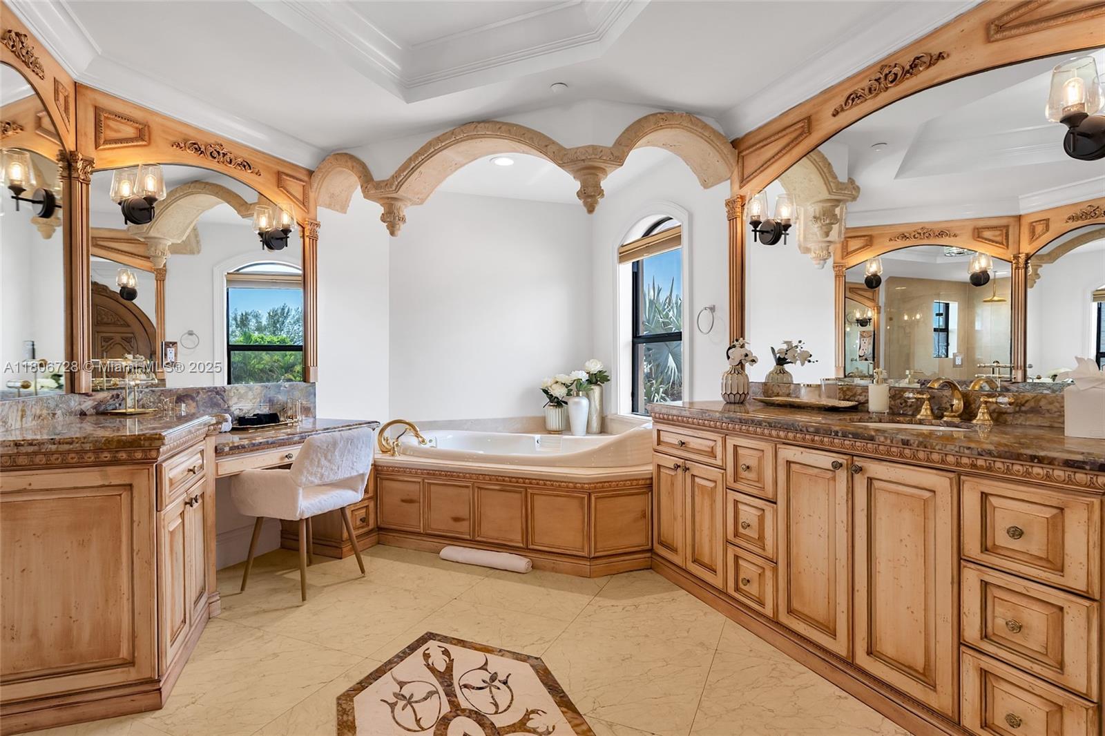 1011 Rhodes Villa Avenue Delray Beach, FL 33483 - Photo 78 of 90 a spacious bathroom with a double vanity sink and a mirror