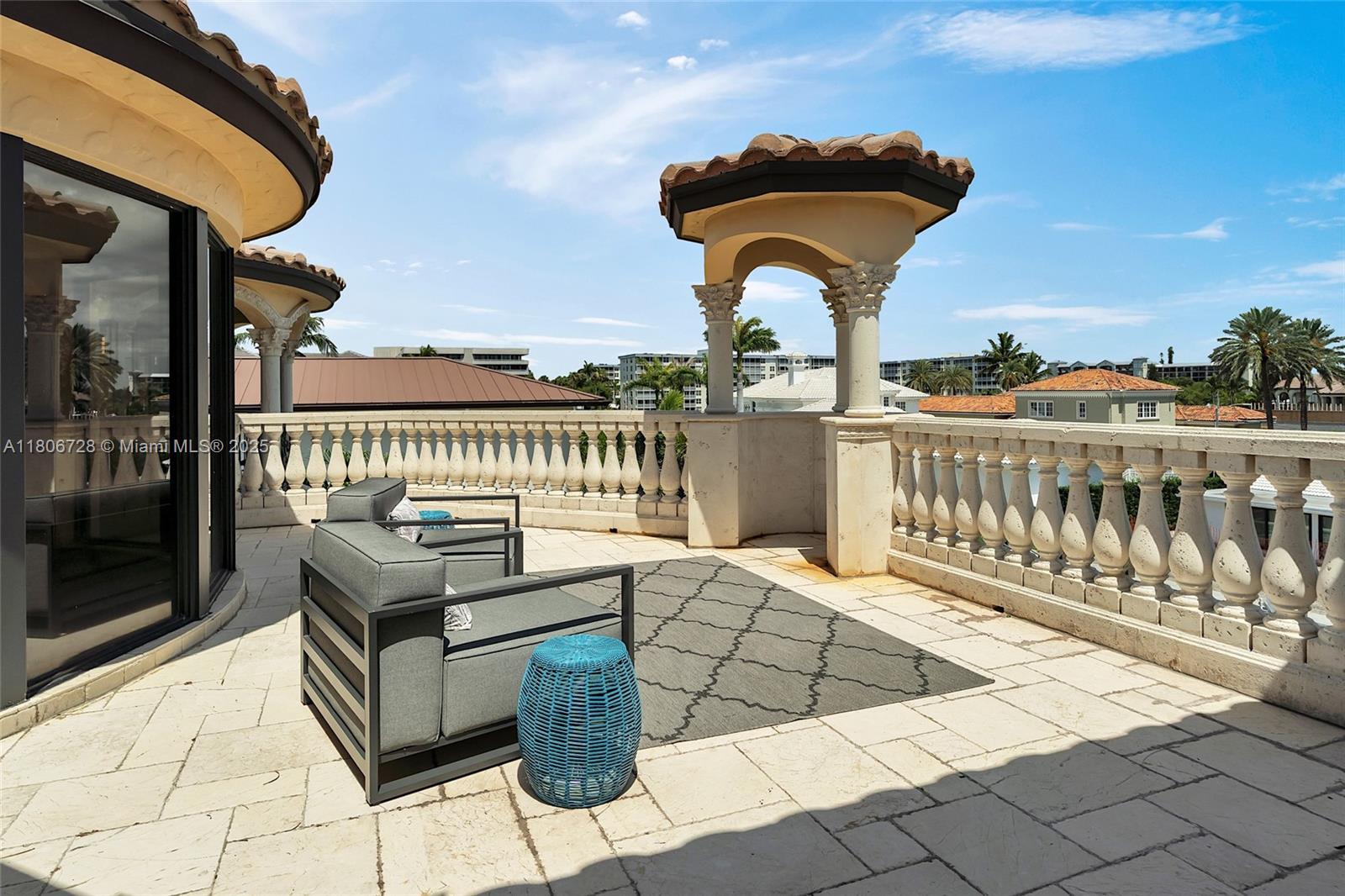 1011 Rhodes Villa Avenue Delray Beach, FL 33483 - Photo 83 of 90 a view of a balcony with furniture