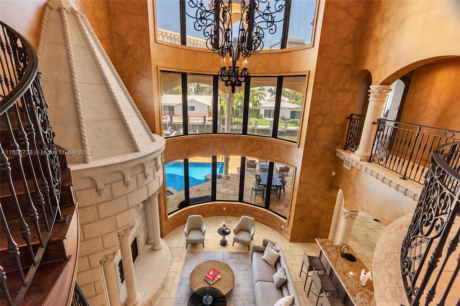 1011 Rhodes Villa Avenue Delray Beach, FL 33483 - Photo 90 of 90 a front view of a house with a lot of windows