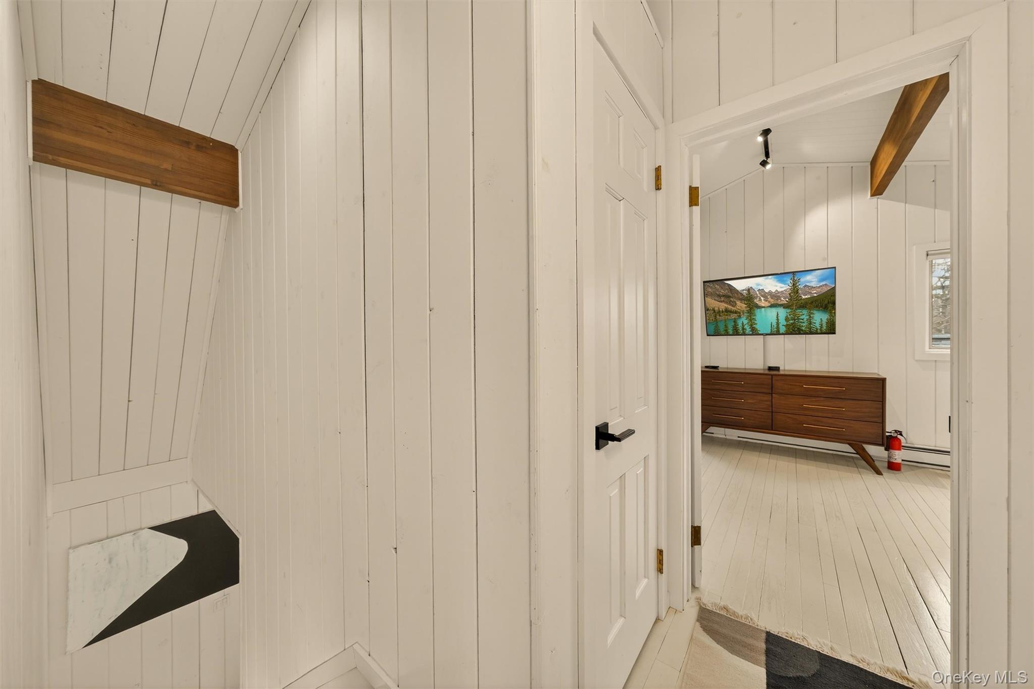 351 Gables Road Narrowsburg, NY 12764 - Photo 35 of 49 a view of a hallway with closet and a couch