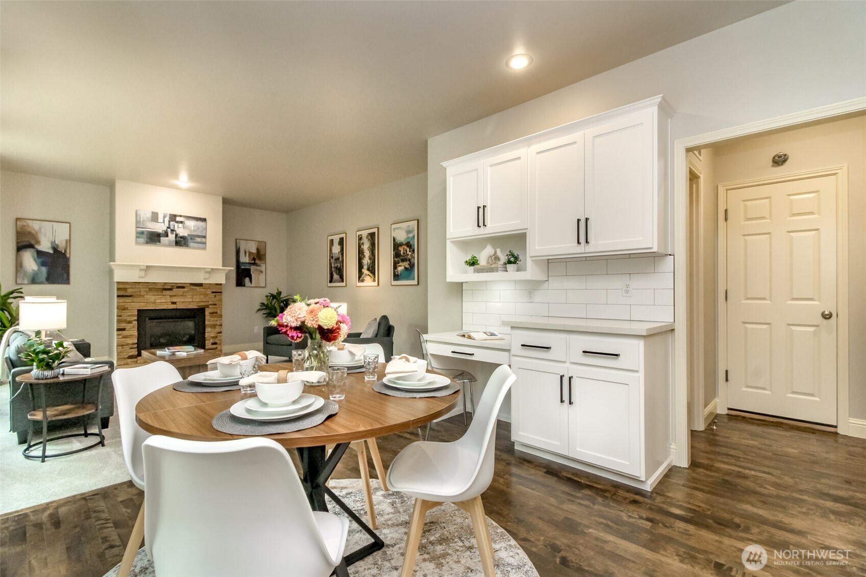 1913 Northeast 32nd Street Renton, WA 98056 - Photo 11 of 40 a view of a dining room with furniture window and wooden floor