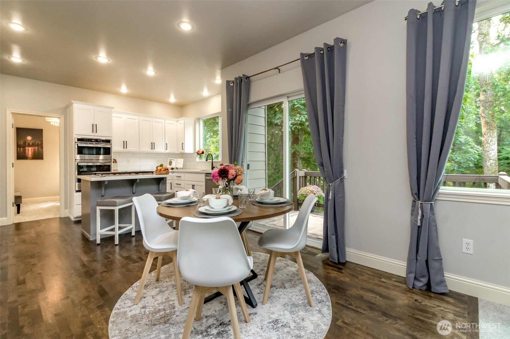 1913 Northeast 32nd Street Renton, WA 98056 - Photo 13 of 40 a dining room with furniture and wooden floor