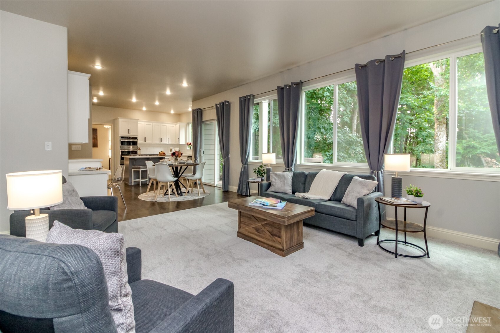 1913 Northeast 32nd Street Renton, WA 98056 - Photo 16 of 40 a living room with furniture and a large window