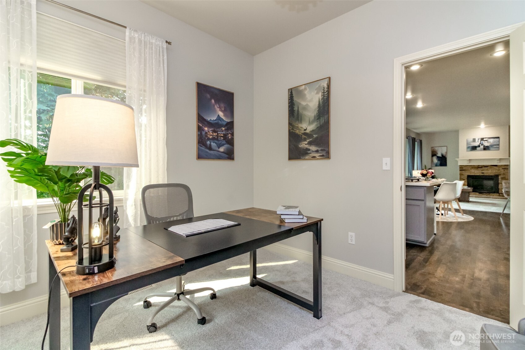 1913 Northeast 32nd Street Renton, WA 98056 - Photo 17 of 40 a view of a workspace with furniture
