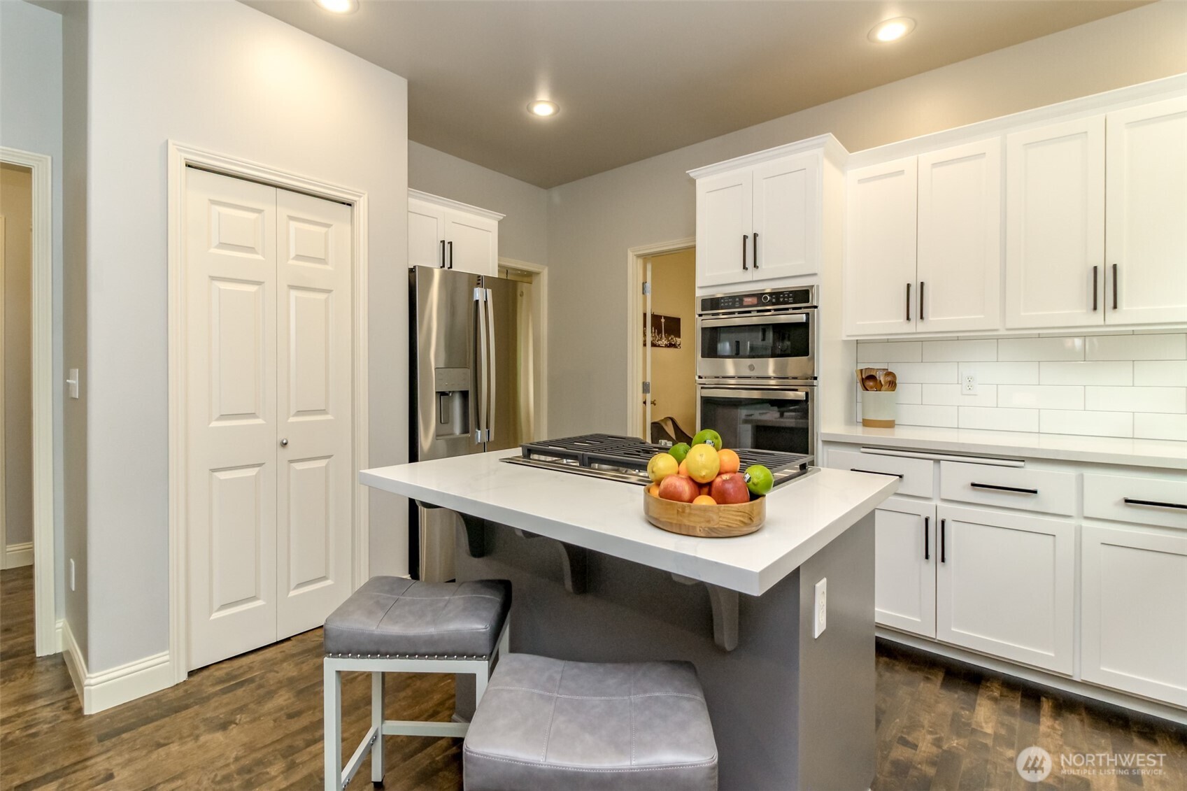 1913 Northeast 32nd Street Renton, WA 98056 - Photo 18 of 40 a kitchen with a refrigerator and cabinets