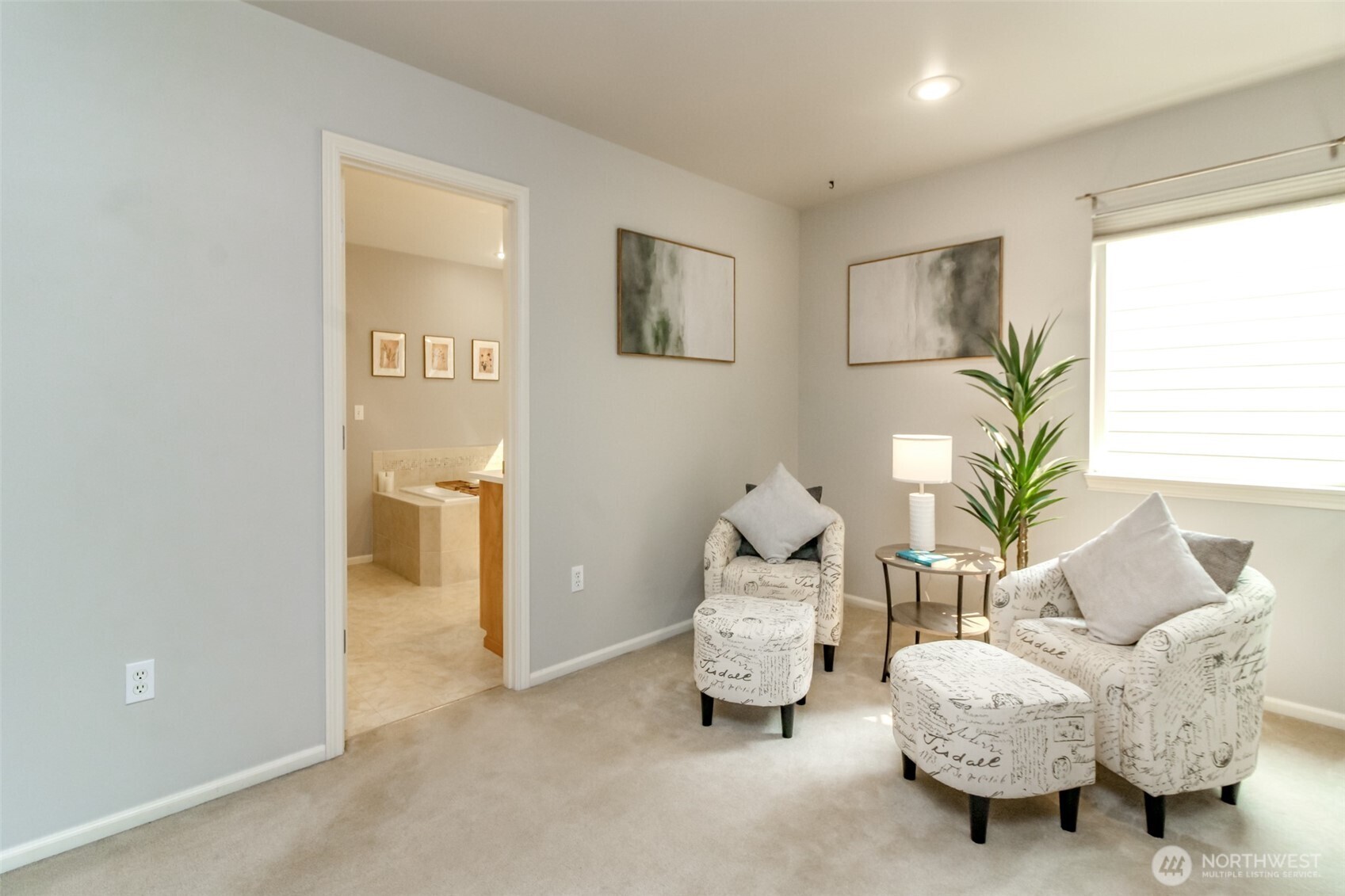1913 Northeast 32nd Street Renton, WA 98056 - Photo 25 of 40 a living room with furniture and a potted plant on the wall
