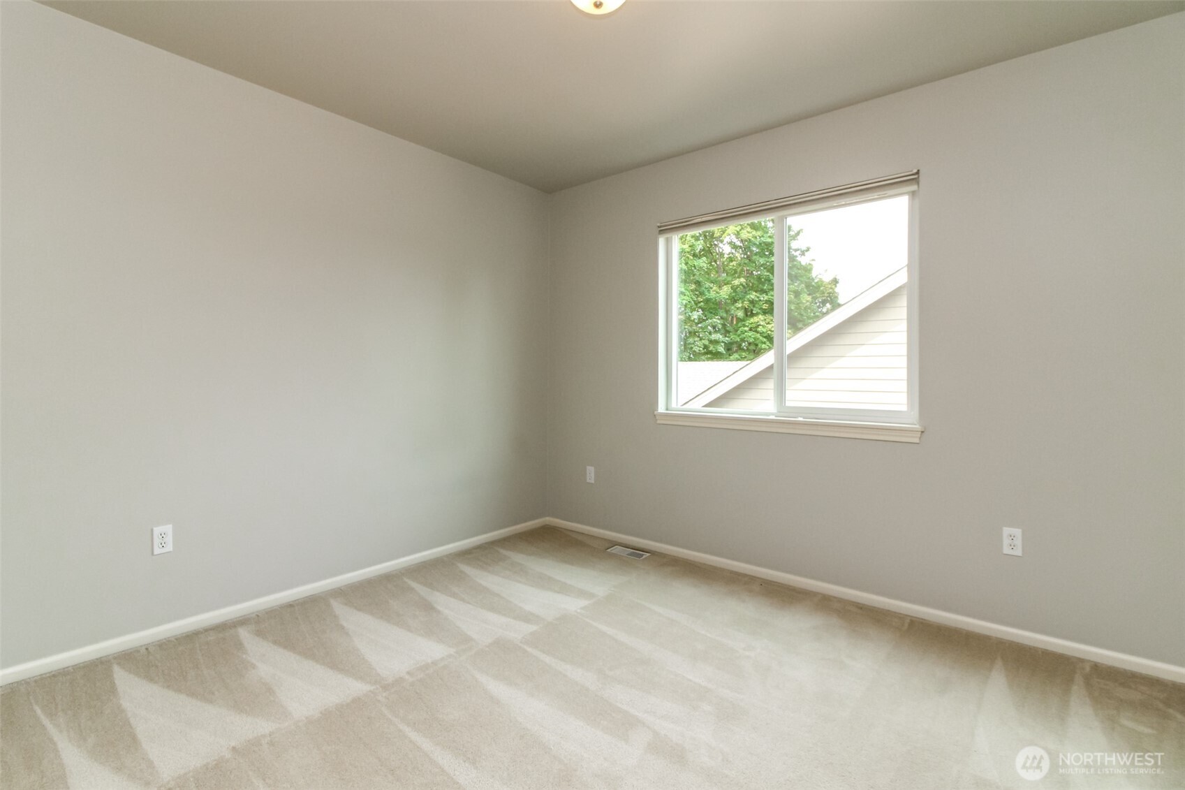 1913 Northeast 32nd Street Renton, WA 98056 - Photo 31 of 40 an empty room with a window