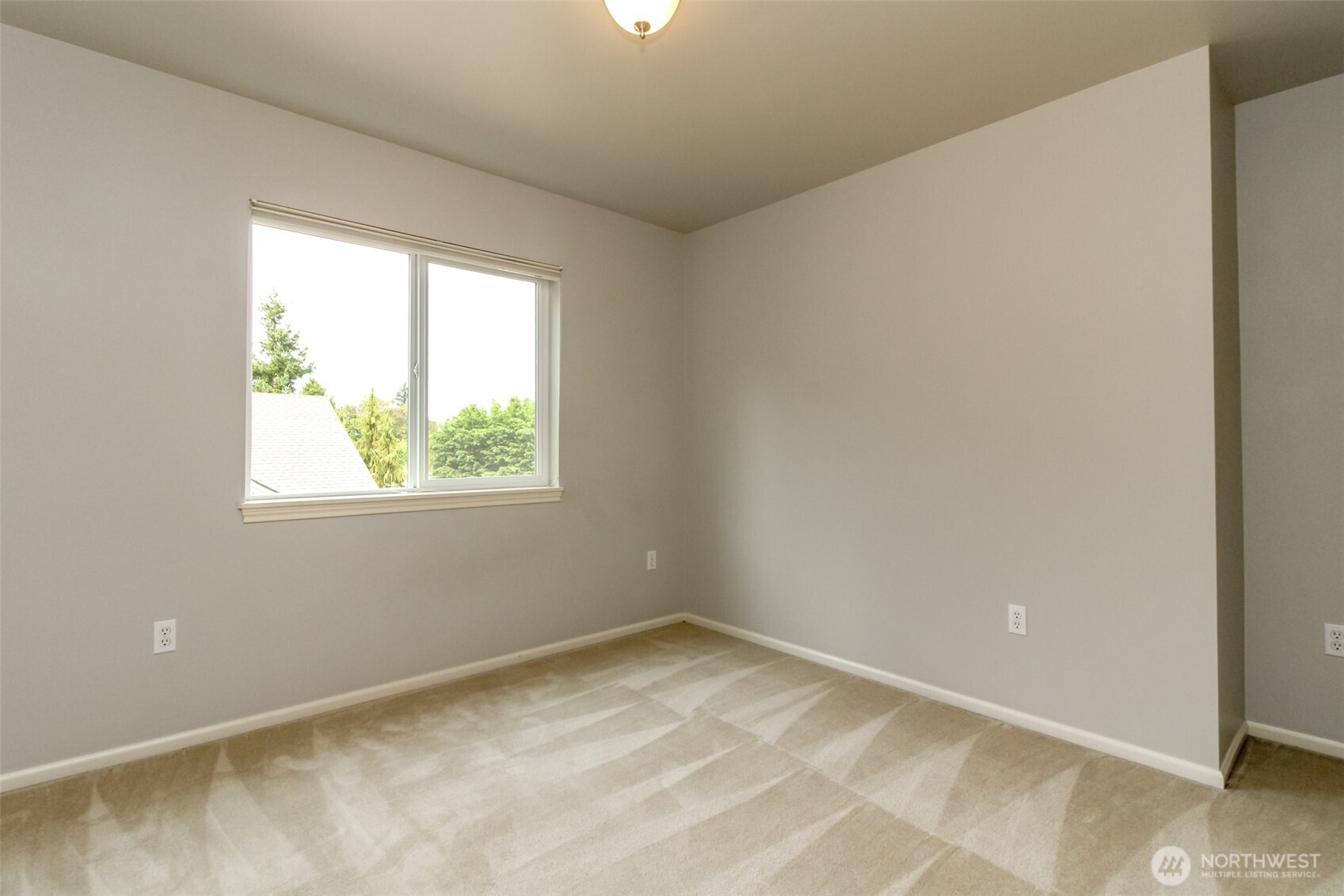 1913 Northeast 32nd Street Renton, WA 98056 - Photo 33 of 40 an empty room with a window