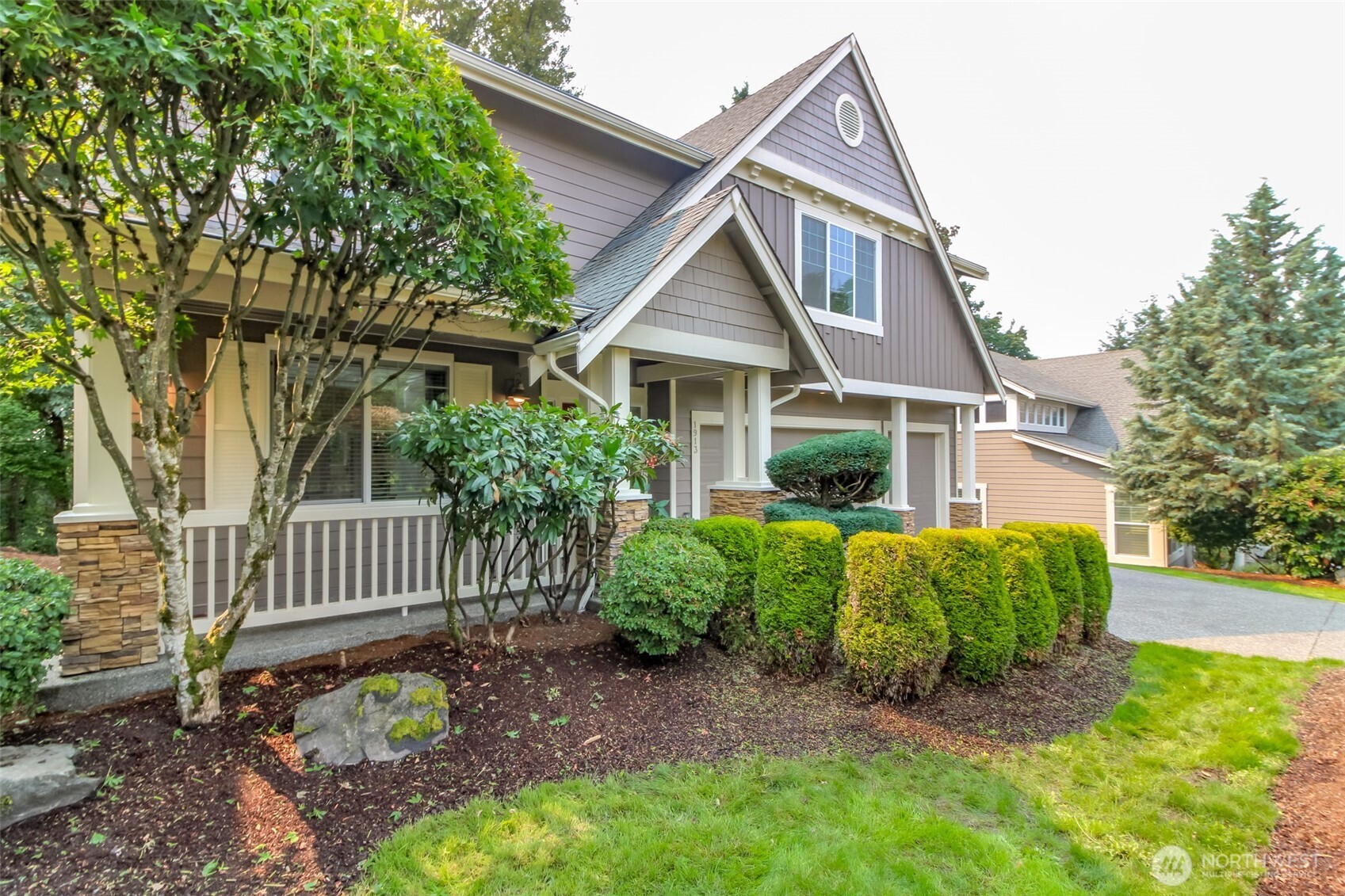1913 Northeast 32nd Street Renton, WA 98056 - Photo 39 of 40 a front view of a house with garden