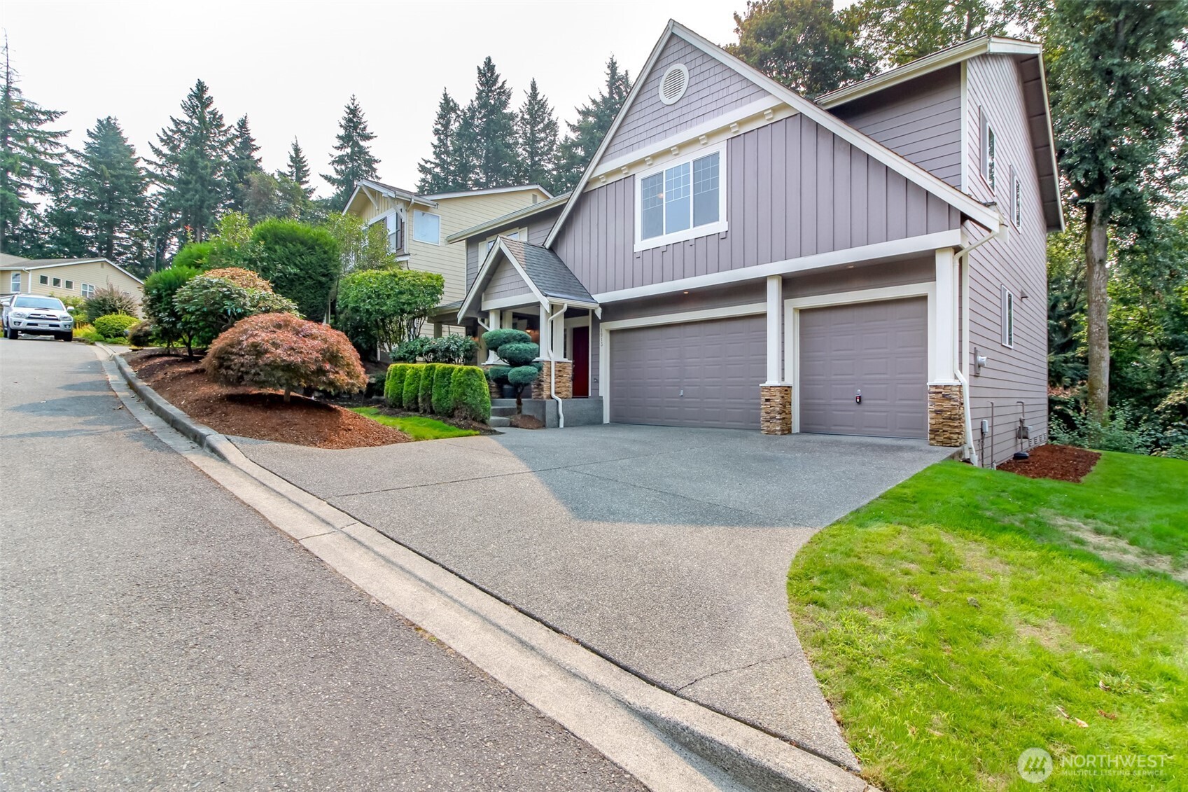 1913 Northeast 32nd Street Renton, WA 98056 - Photo 40 of 40 a view of a house with a yard and garage