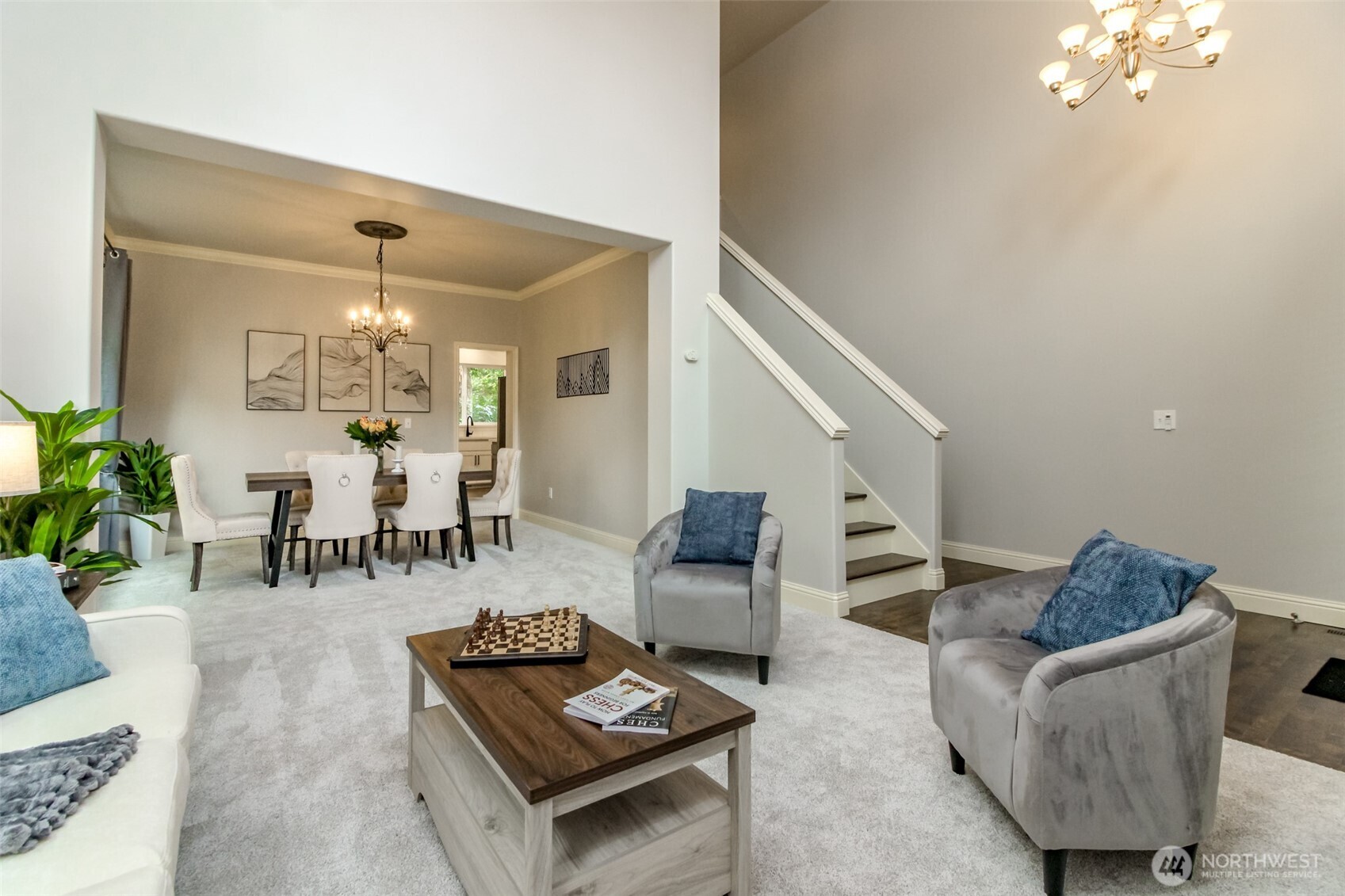 1913 Northeast 32nd Street Renton, WA 98056 - Photo 4 of 40 a living room with furniture and a chandelier