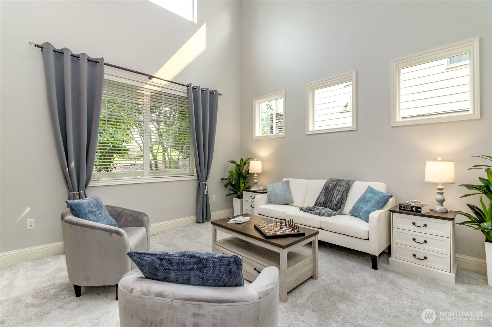 1913 Northeast 32nd Street Renton, WA 98056 - Photo 5 of 40 a living room with furniture and a large window
