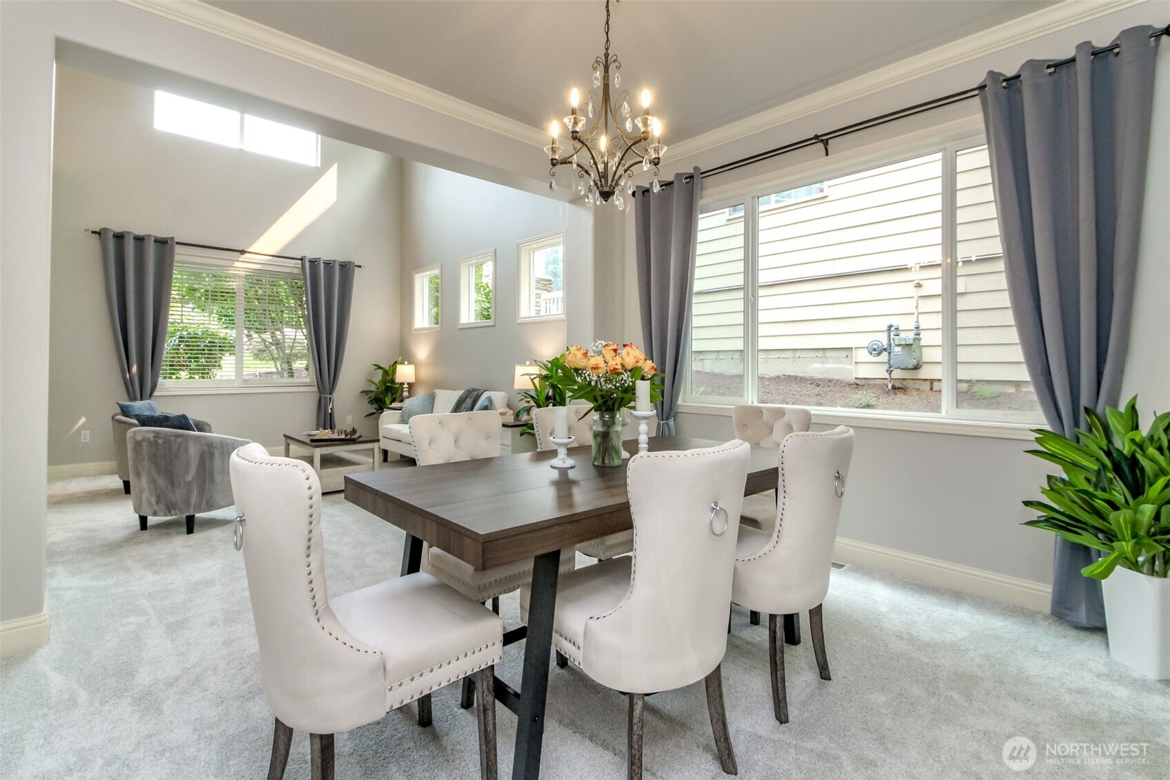 1913 Northeast 32nd Street Renton, WA 98056 - Photo 7 of 40 a view of a dining room with furniture window and outside view