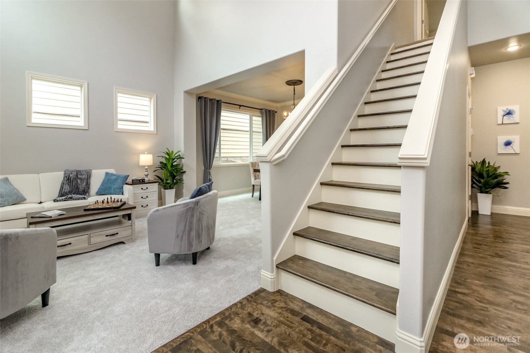 1913 Northeast 32nd Street Renton, WA 98056 - Photo 8 of 40 a living room with furniture and a potted plant