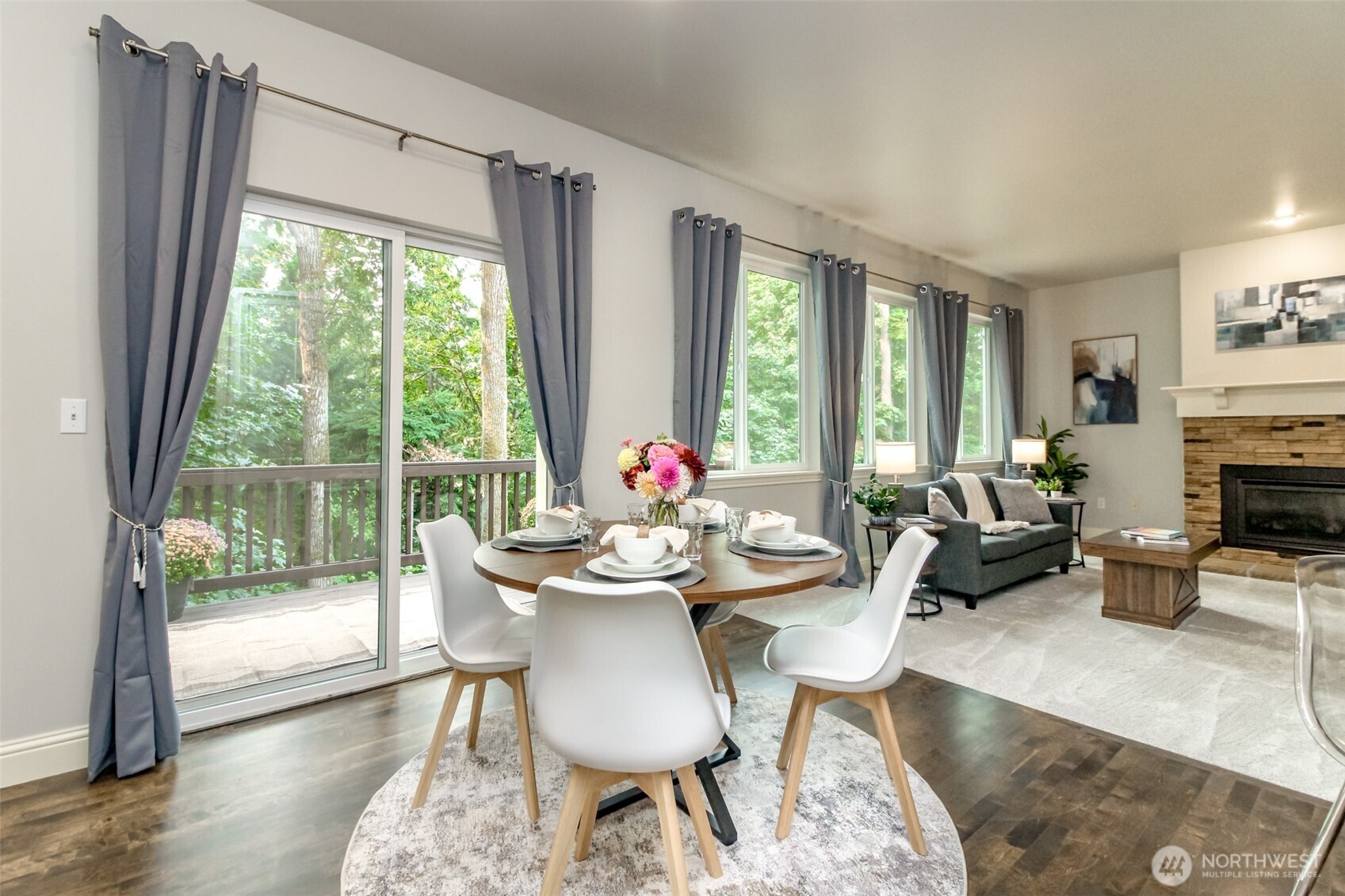 1913 Northeast 32nd Street Renton, WA 98056 - Photo 10 of 40 a view of a dining room with furniture window and outside view