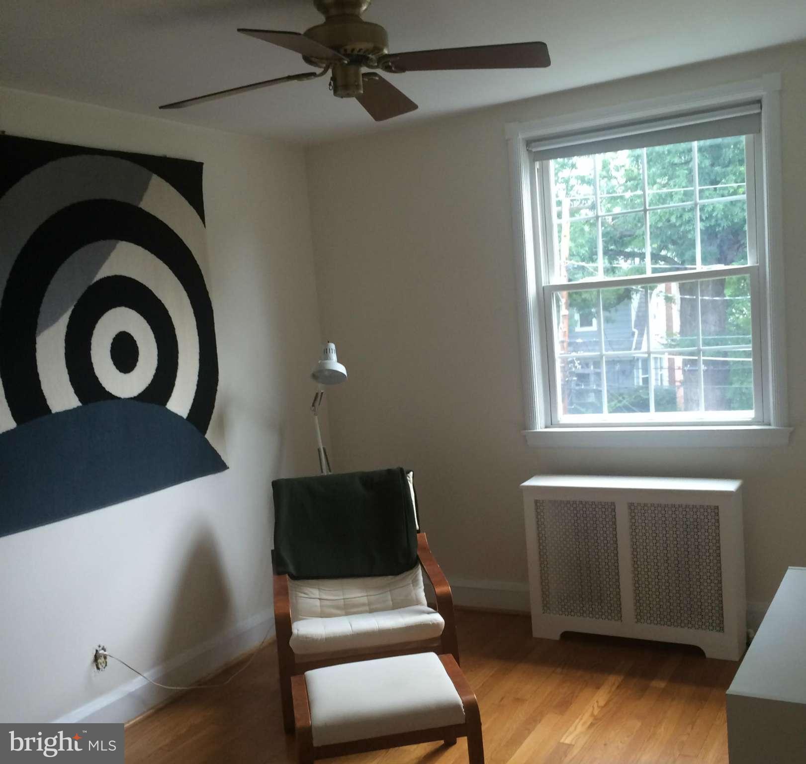 309 Westowne Road Baltimore, MD 21229 - Photo 12 of 20 a living room with furniture and a window