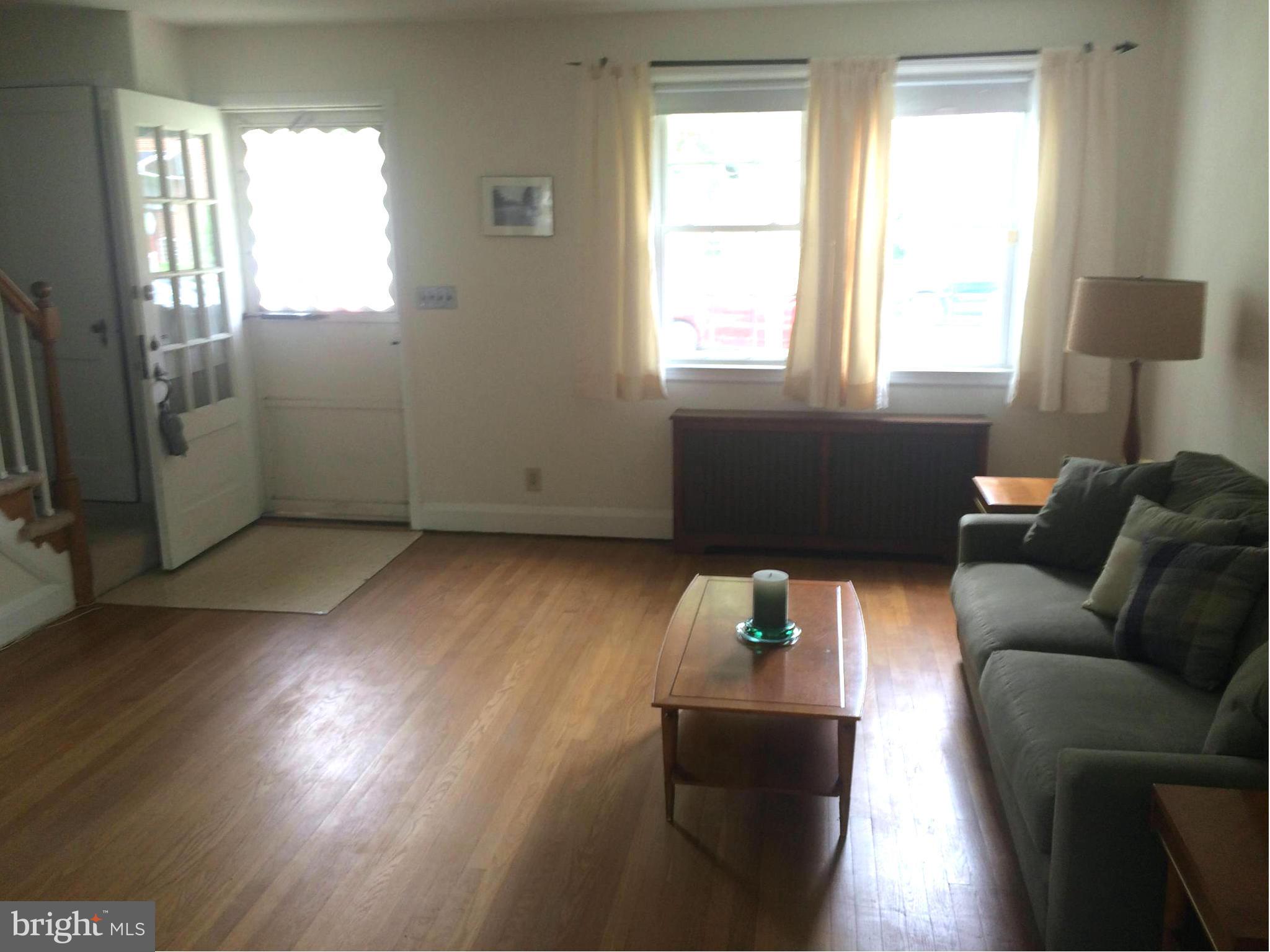 309 Westowne Road Baltimore, MD 21229 - Photo 3 of 20 a living room with furniture and a window