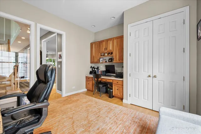 a bathroom with a toilet a sink and a mirror
