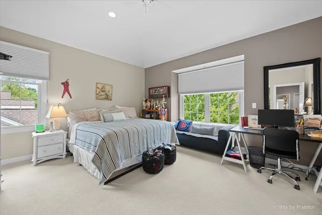 a view of a livingroom with furniture and a window