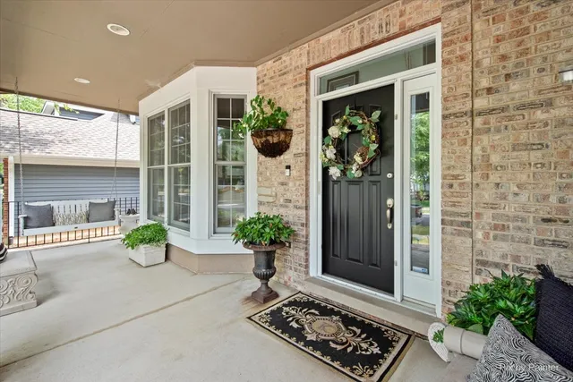 a front view of a house with yard