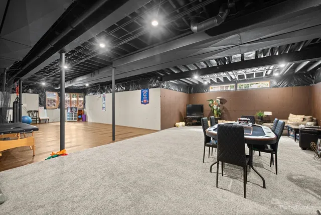 a view of water heater room with gym equipment