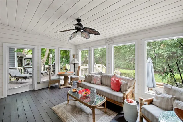 a view of a patio with a table and chairs