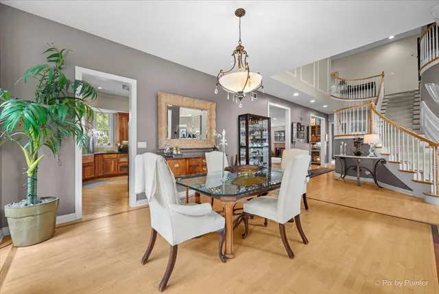 a dining room with furniture a livingroom and chandelier