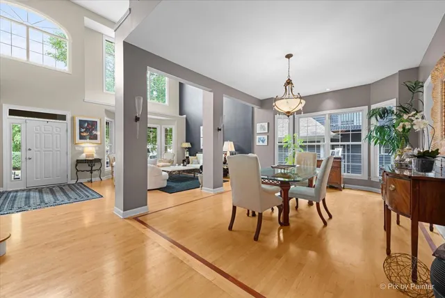 a view of a dining room with furniture window and outside view