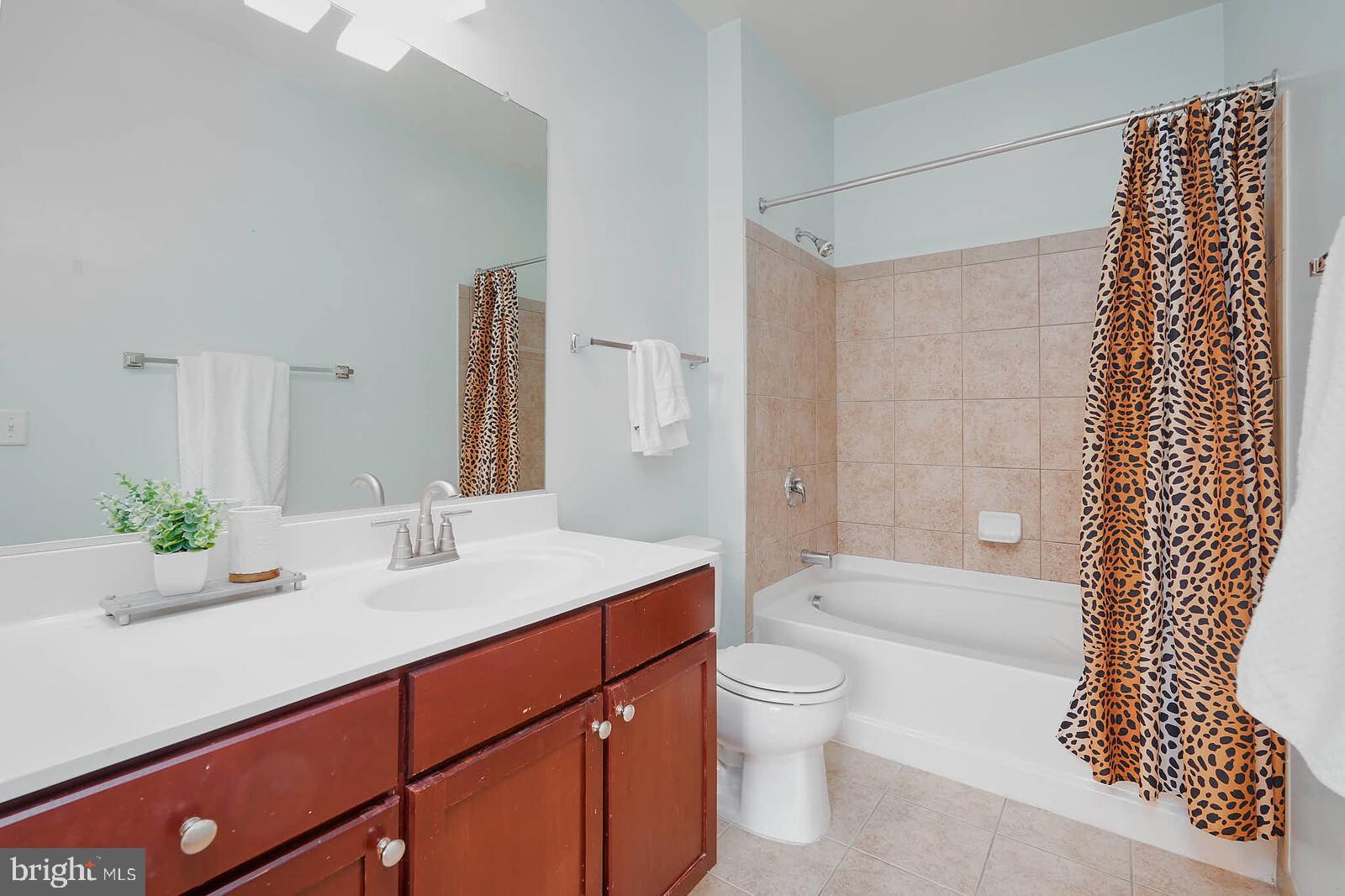 1391 Pennsylvania Ave. Southeast, Unit 331 Washington, DC 20003 - Photo 16 of 29 Chic bathroom with playful accents.