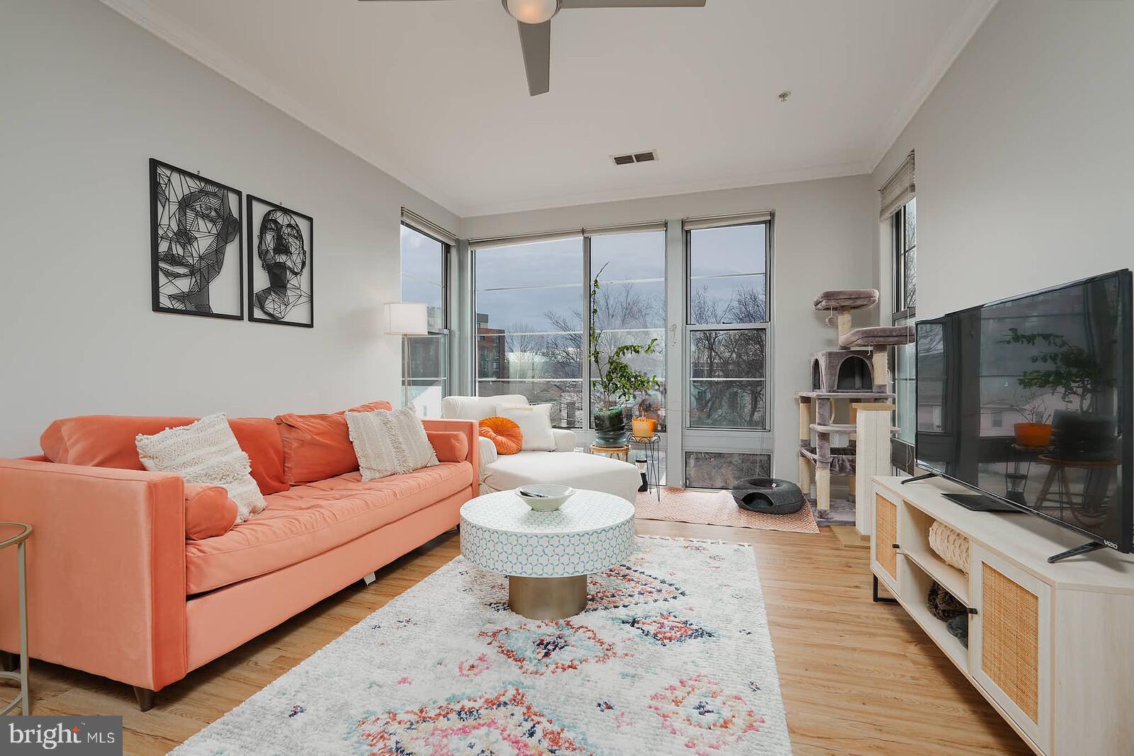 1391 Pennsylvania Ave. Southeast, Unit 331 Washington, DC 20003 - Photo 6 of 29 Bright and airy living space with modern flair.