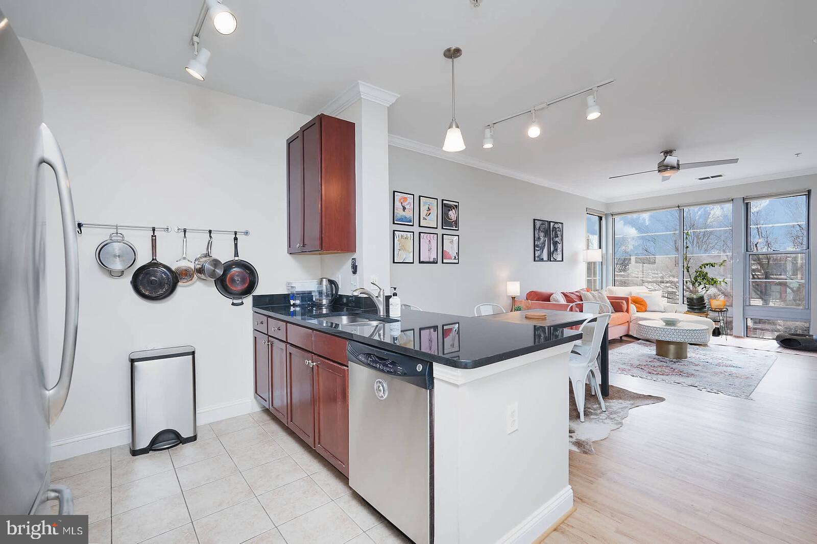 1391 Pennsylvania Ave. Southeast, Unit 331 Washington, DC 20003 - Photo 9 of 29 Modern kitchen with open living space.