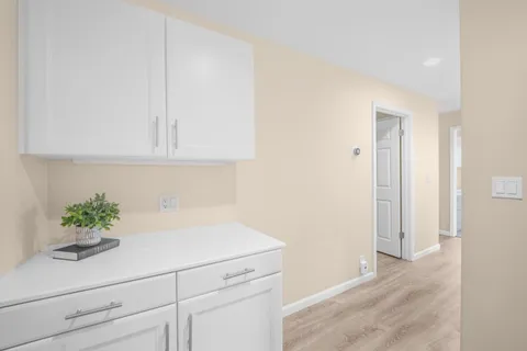 a room with storage and utility room