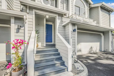 a front view of a house with a porch