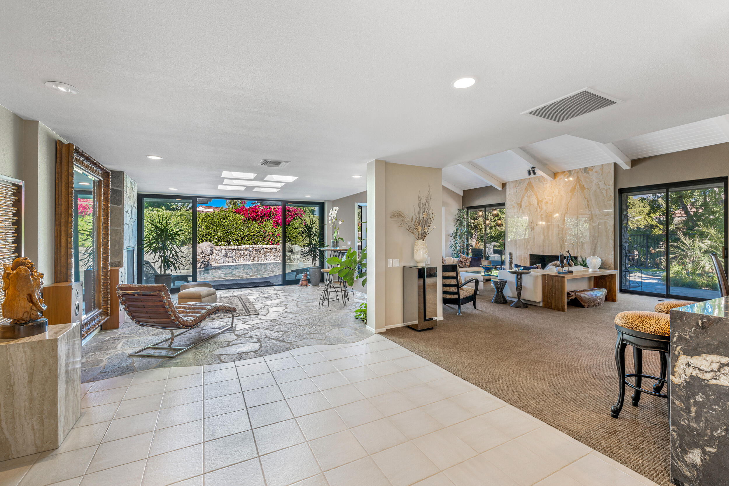 15 Johnar Boulevard Rancho Mirage, CA 92270 - Photo 11 of 68 a living room with furniture and a large window