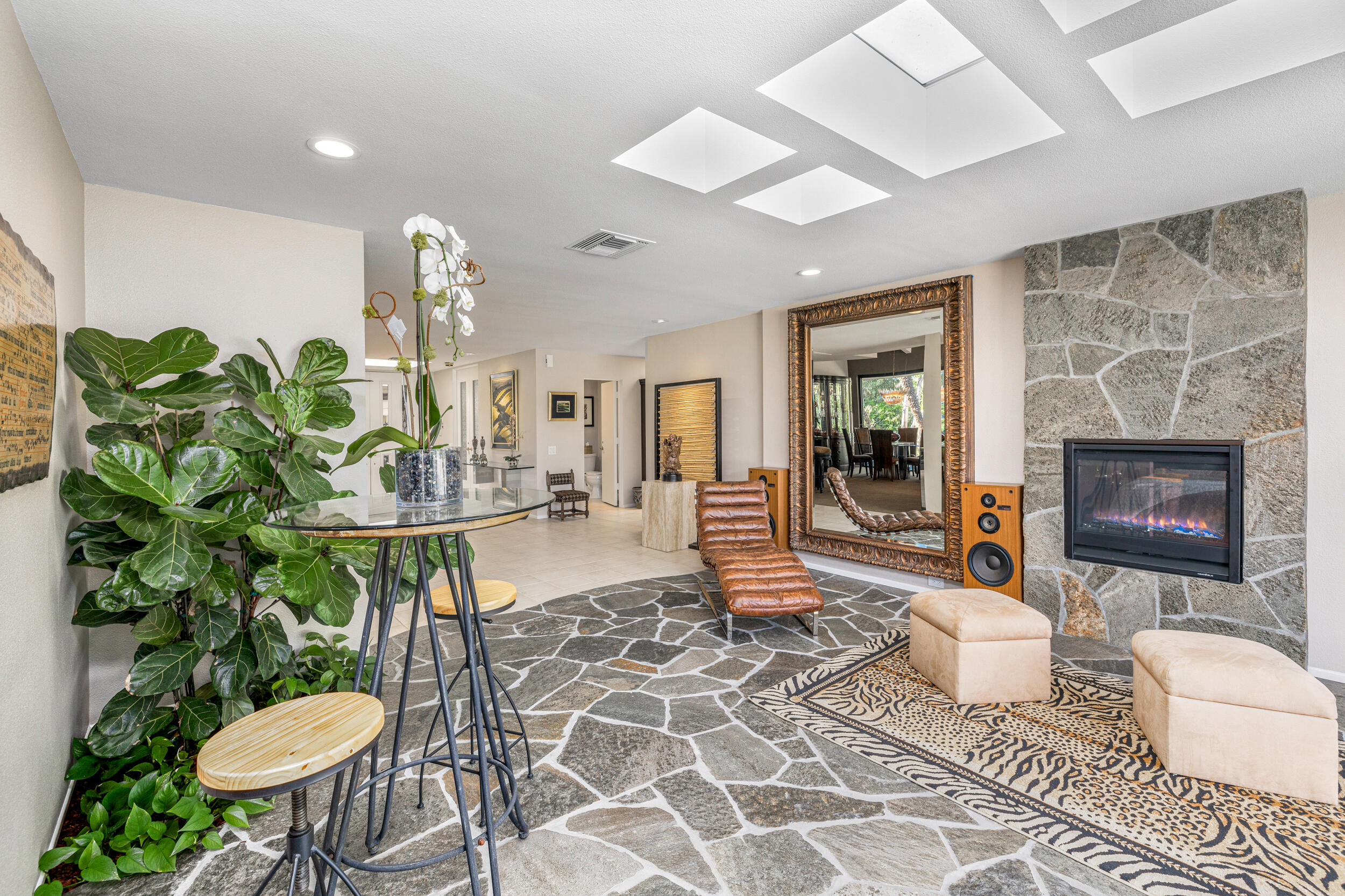15 Johnar Boulevard Rancho Mirage, CA 92270 - Photo 12 of 68 a living room with furniture and a fireplace